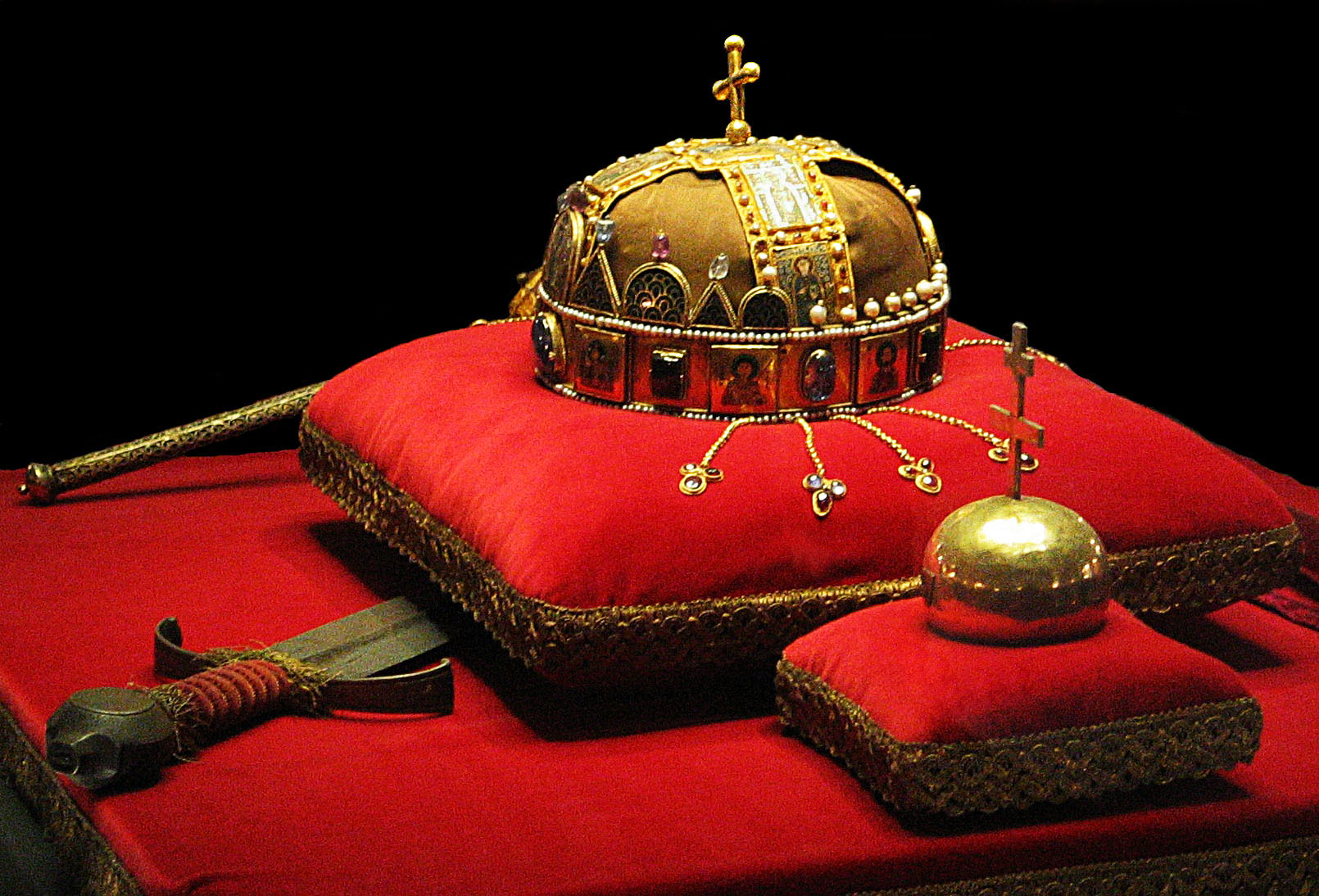 The symbols of the Kingdom of Hungary—the crown, sword, scepter, and orb—are said to have belonged to the first king, Saint Stephen. © Wikimedia.org